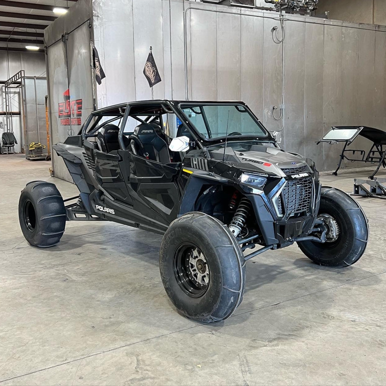 voodoo fast back roll cage installed on black polaris turbo s