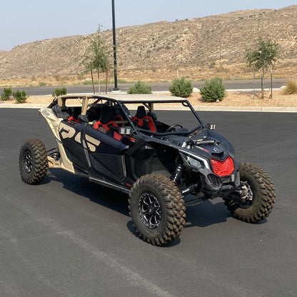 canam x3 with voodoo roll cage installed with black and tan coloring